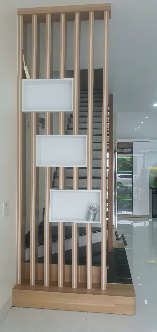 Vách ngăn trang trí bằng lam gỗ CNC phân chia không gian tinh tế - Nội Thất Hà Tuấn LX